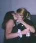 two drunk girls kissing each others