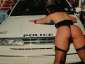 drunk girl bending over a police car flashing her ass
